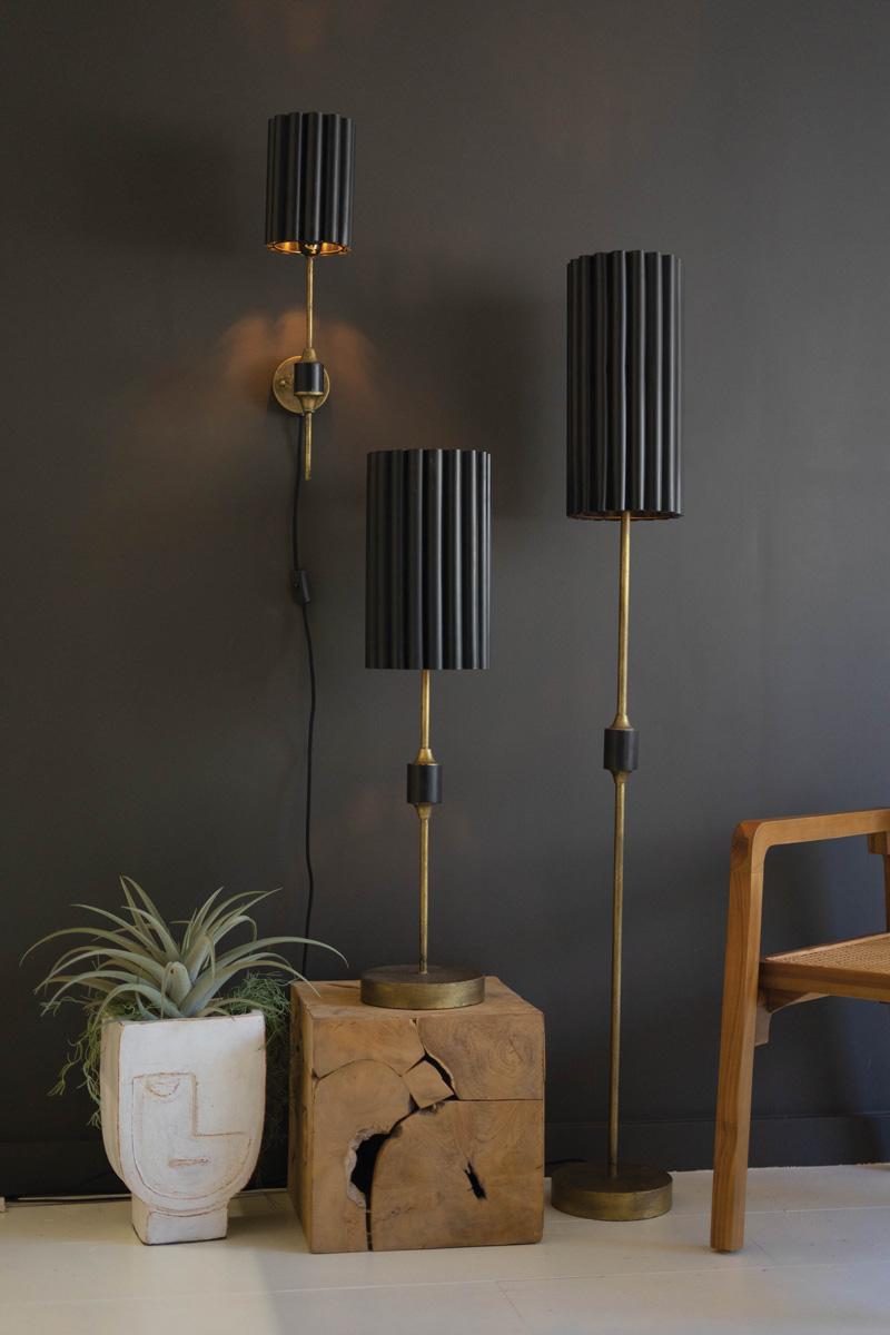 Antique Gold Table Lamp with Fluted Black Metal Shade, A tall antique gold table lamp with a fluted black metal shade.
