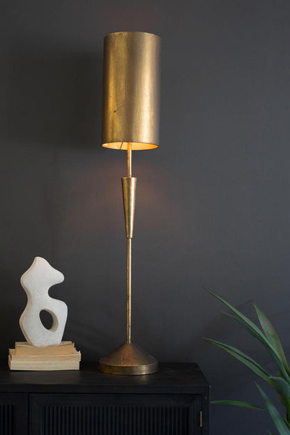 Antique Gold Table Lamp with Metal Barrel Shades, A tall antique gold table lamp with a conical metal shade.