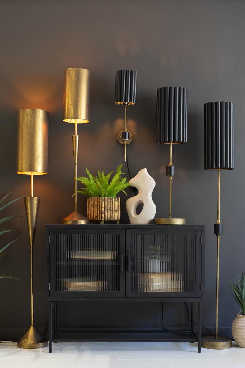 Antique Gold Table Lamp with Fluted Black Metal Shade, A tall antique gold table lamp with a fluted black metal shade.
