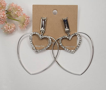 DOUBLE HEART DANGLE EARRINGS.