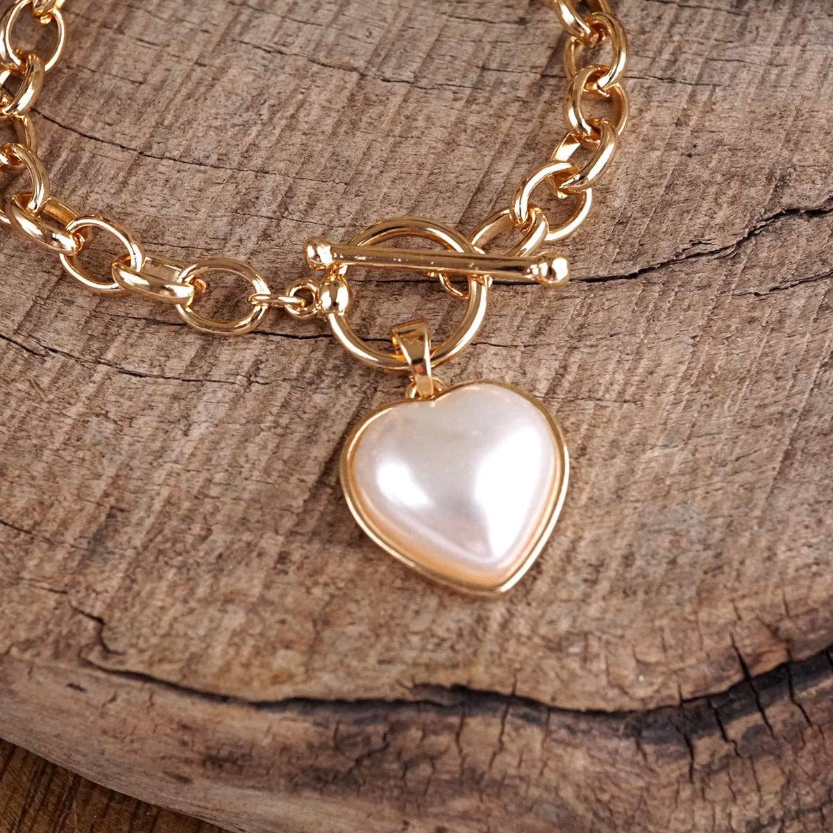 Soft Devotion – Pearlized Puffy Heart Toggle Chain Bracelet in Gold