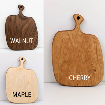 Tabla de embutidos de madera con asa - Redondeada