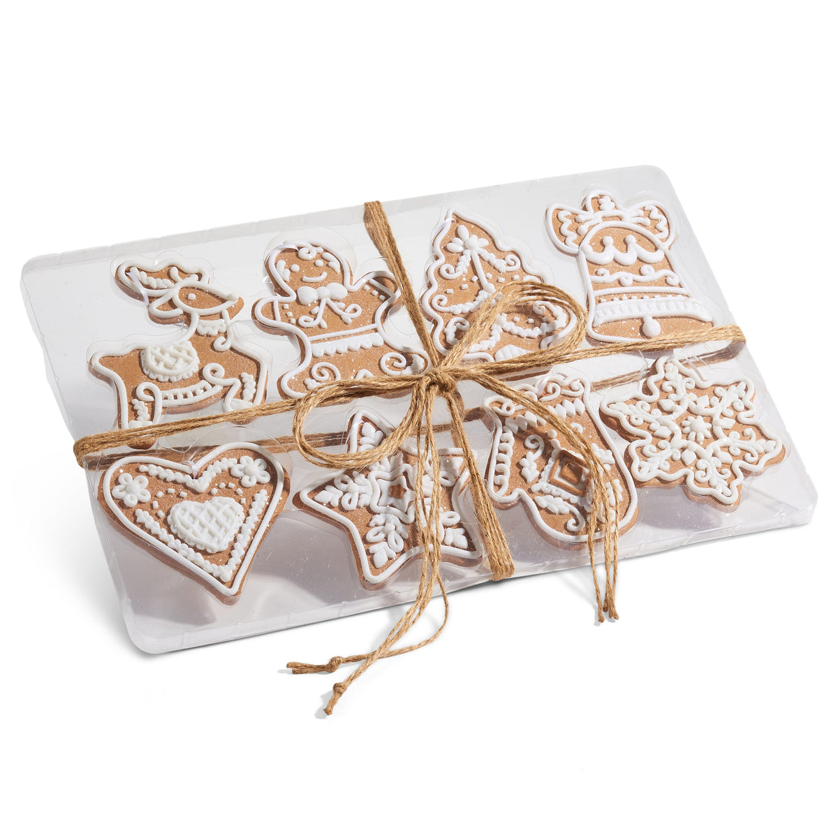 Box of Gingerbread Ornaments, A box of eight flat clay gingerbread-shaped ornaments with white icing detail, tied with twine, including a reindeer, gingerbread man, heart, tree, bell, star, and snowflakes.