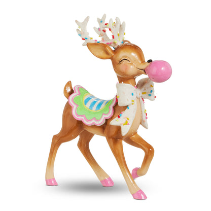 Bubblegum Blowin' Reindeer, A brown reindeer figurine blowing a pink bubblegum bubble, with sprinkle dusted antlers, a candy striped saddle blanket, a sprinkle covered neck bow, and pink hooves.