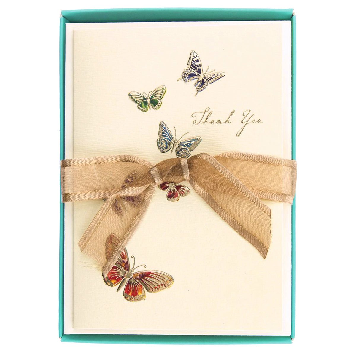 La Petite Presse Butterflies Boxed Notes, A cream Thank You card with six jeweled-tone foil butterflies rising toward gold script, tied with a tan ribbon inside a teal box.