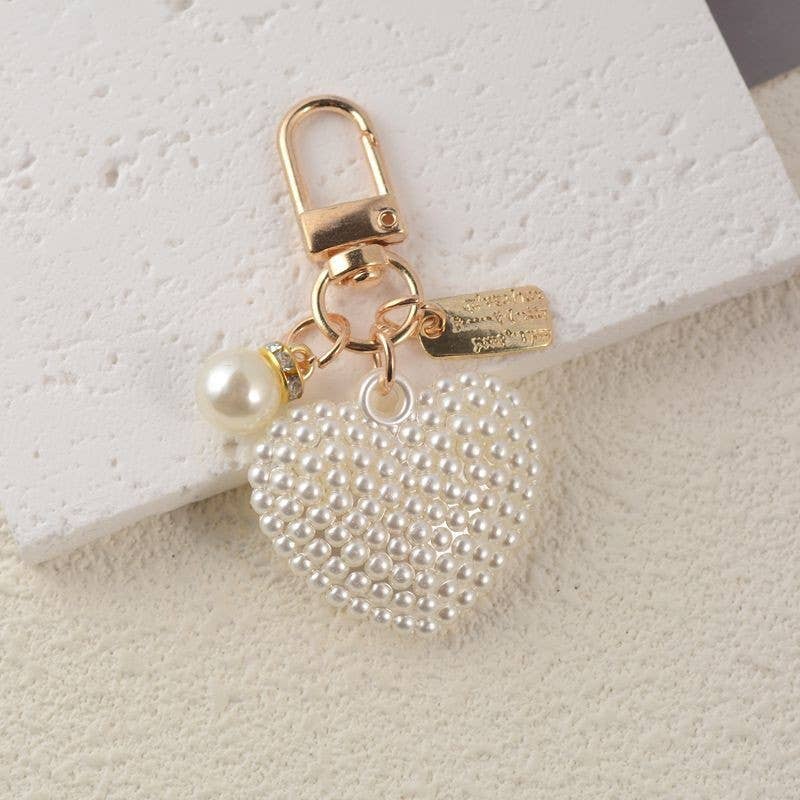 LLAVERO CON CORAZÓN DE PERLA HINCHADO PARA BOLSO