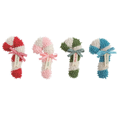 Candy Cane Plush Dog Toy, Four shaggy plush candy cane dog toys in red, pink, green and blue stripes, each tied with a ribbon and tag.