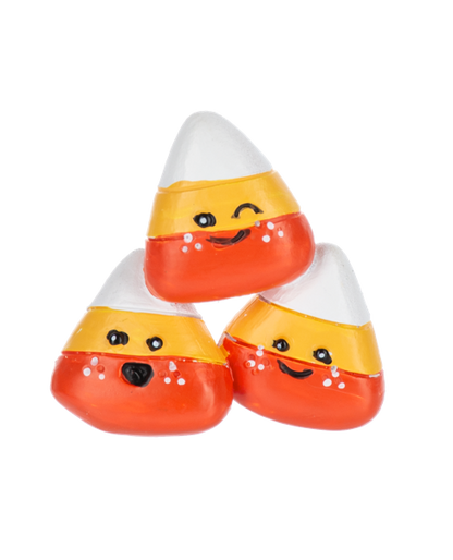 Candy Corn Cuties Pocket Charm, Three smiling candy corn figurines in white, yellow and red-orange with freckled cheeks.