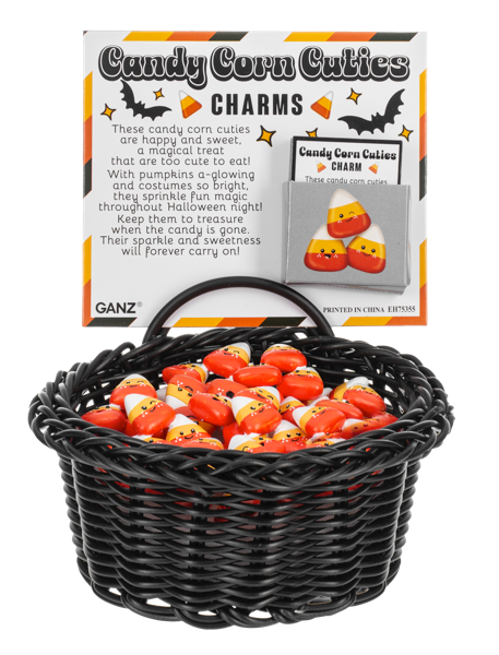 Candy Corn Cuties Pocket Charm, Three smiling candy corn figurines in white, yellow and red-orange with freckled cheeks.