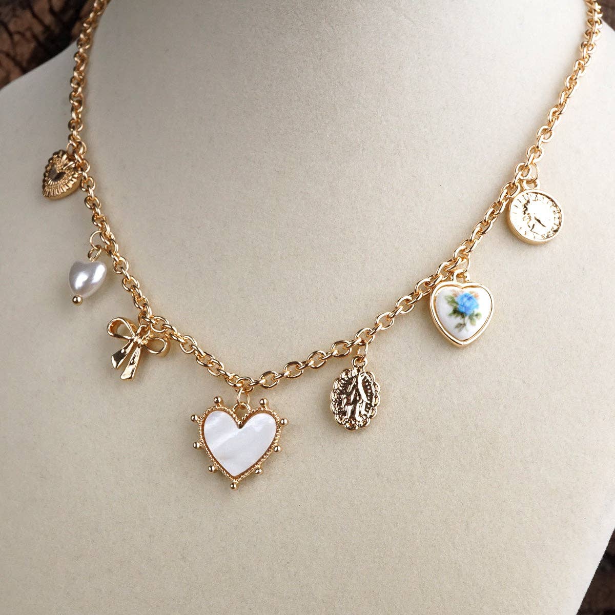 Multi-Charm Heart Necklace in Gold Tone