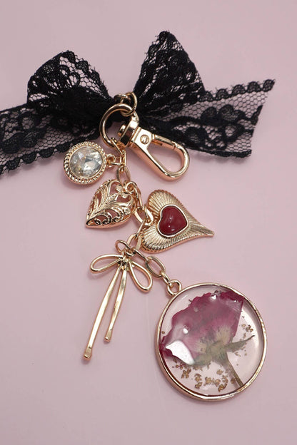BAG CHARM-DRIED FLOWER BOW HEART RHINESTONE
