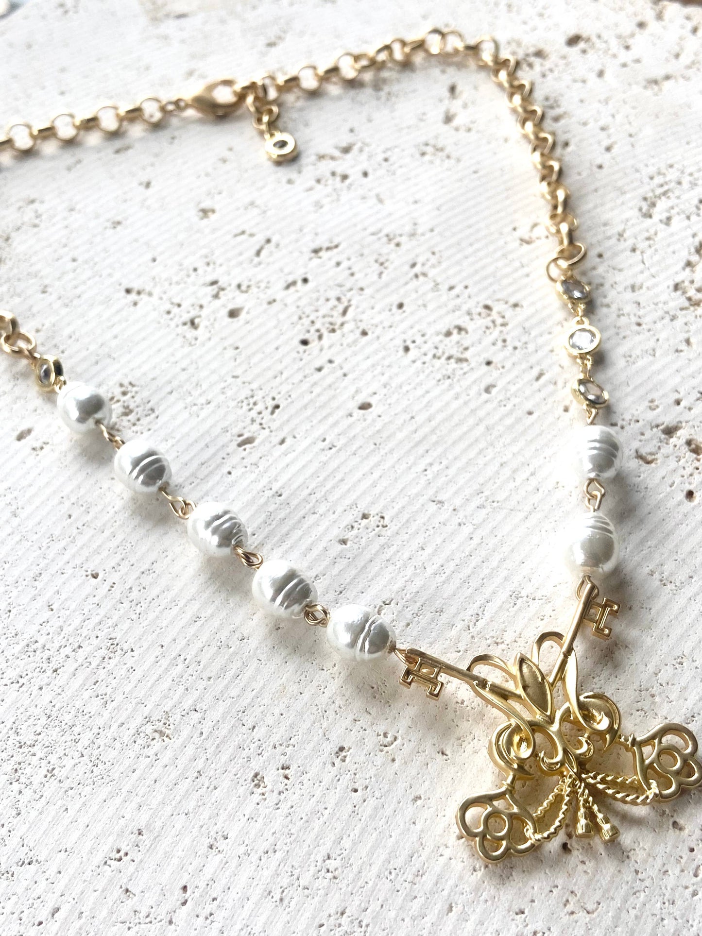 Fleur de lis French matte gold pearl necklace