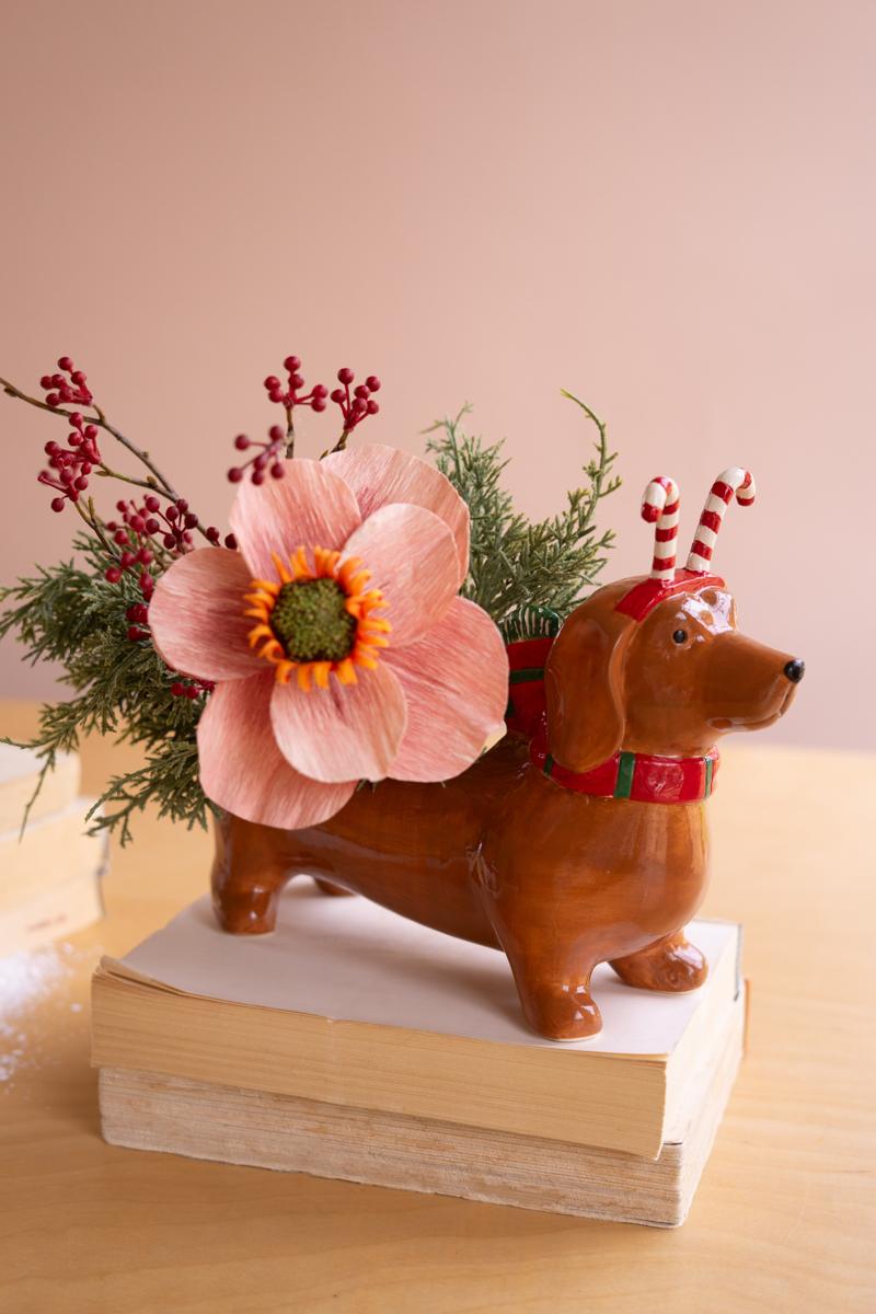 Ceramic Christmas Dachshund Planter with a Candy Cane Headband, A glossy ceramic dachshund planter wearing a painted candy cane headband.