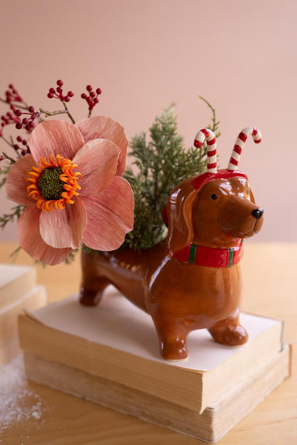 Ceramic Christmas Dachshund Planter with a Candy Cane Headband, A glossy ceramic dachshund planter wearing a painted candy cane headband.