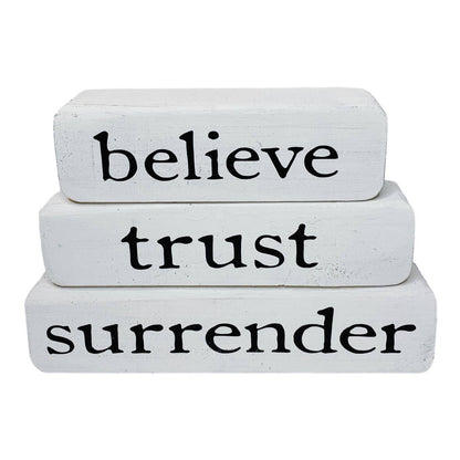 Believe Trust Surrender – Brown Stacked Blocks