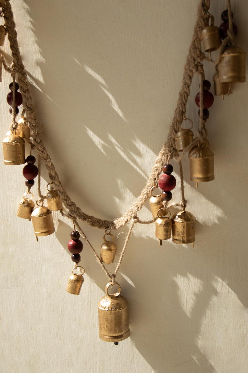 Christmas Bell Garland with Wood Beads, A garland of hanging metal bells strung with wood beads on jute cord.