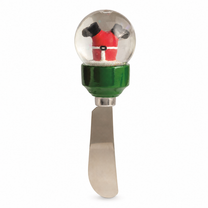 Christmas Snow Globe Cheese Spreader, Santa design: Santa headed down the chimney boots first on green, and a top-hatted snowman on red