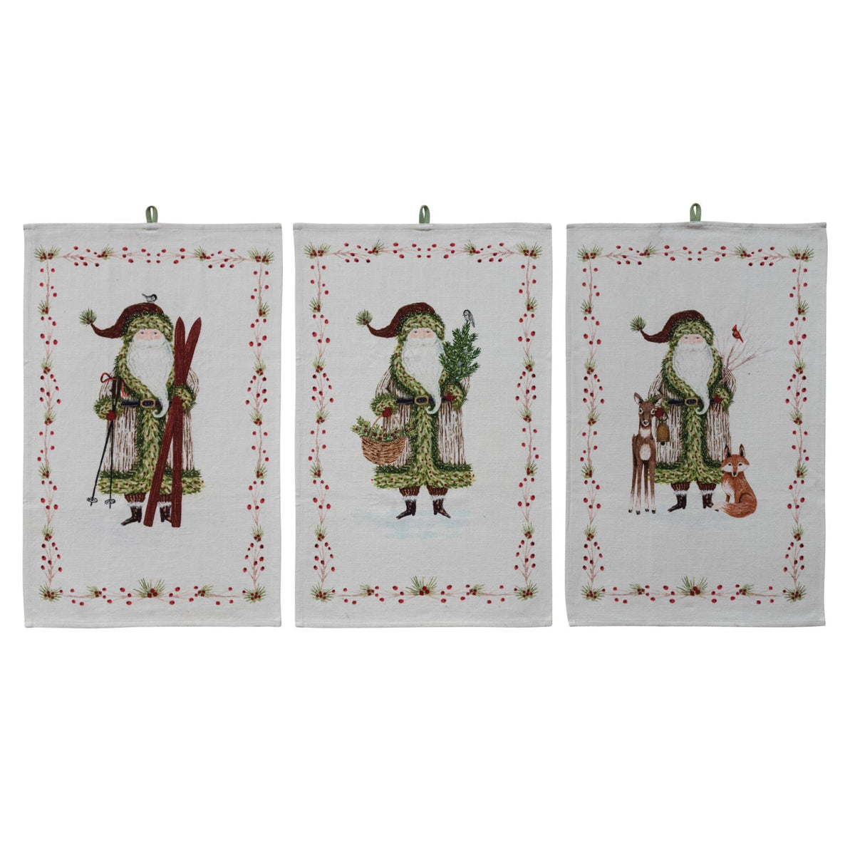 Cotton Slub Printed Tea Towel with Santa and Berries Border, Three cotton tea towels each printed with a folk-art Santa in a different scene, one with skis, one with a basket and tree, one with a fawn and a fox, all bordered in berries and pine.