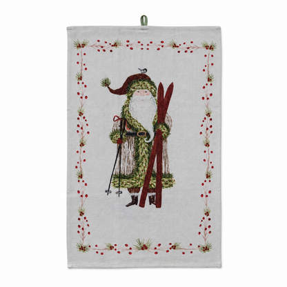 Cotton Slub Printed Tea Towel with Santa and Berries Border, Santa with Skis design: Santa stands with red skis and poles, a bird on his hat