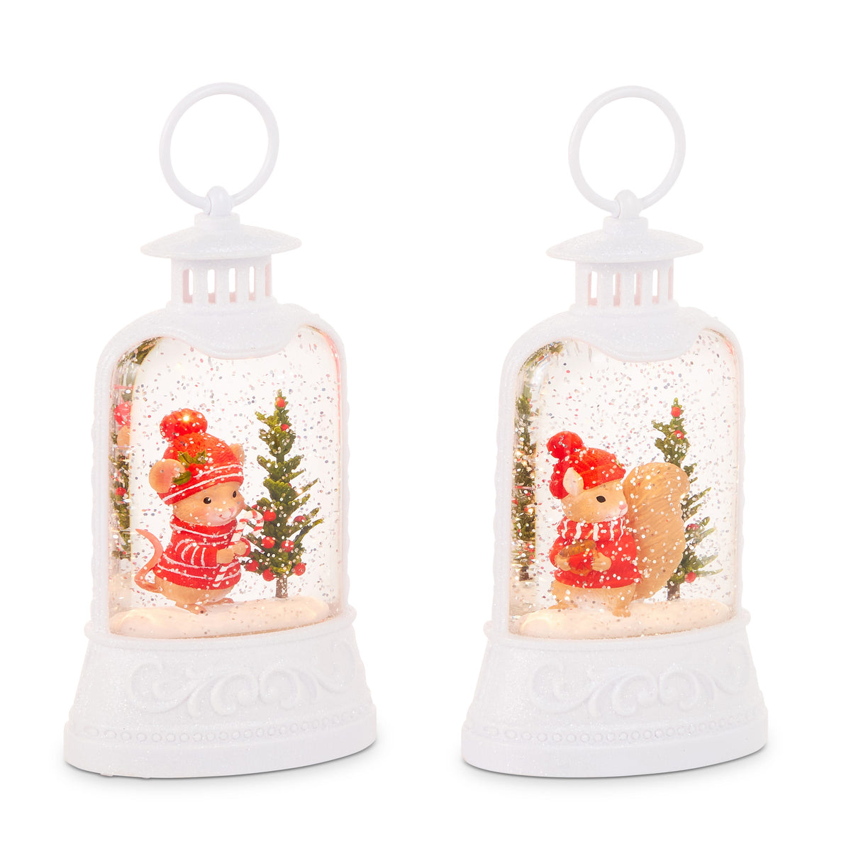Cozy Critter Christmas Lighted Water Lantern, Two white lanterns side by side, one with a mouse in a red knit hat holding a candy cane and one with a squirrel in a red knit hat, each beside a small berry-trimmed tree in swirling glitter.