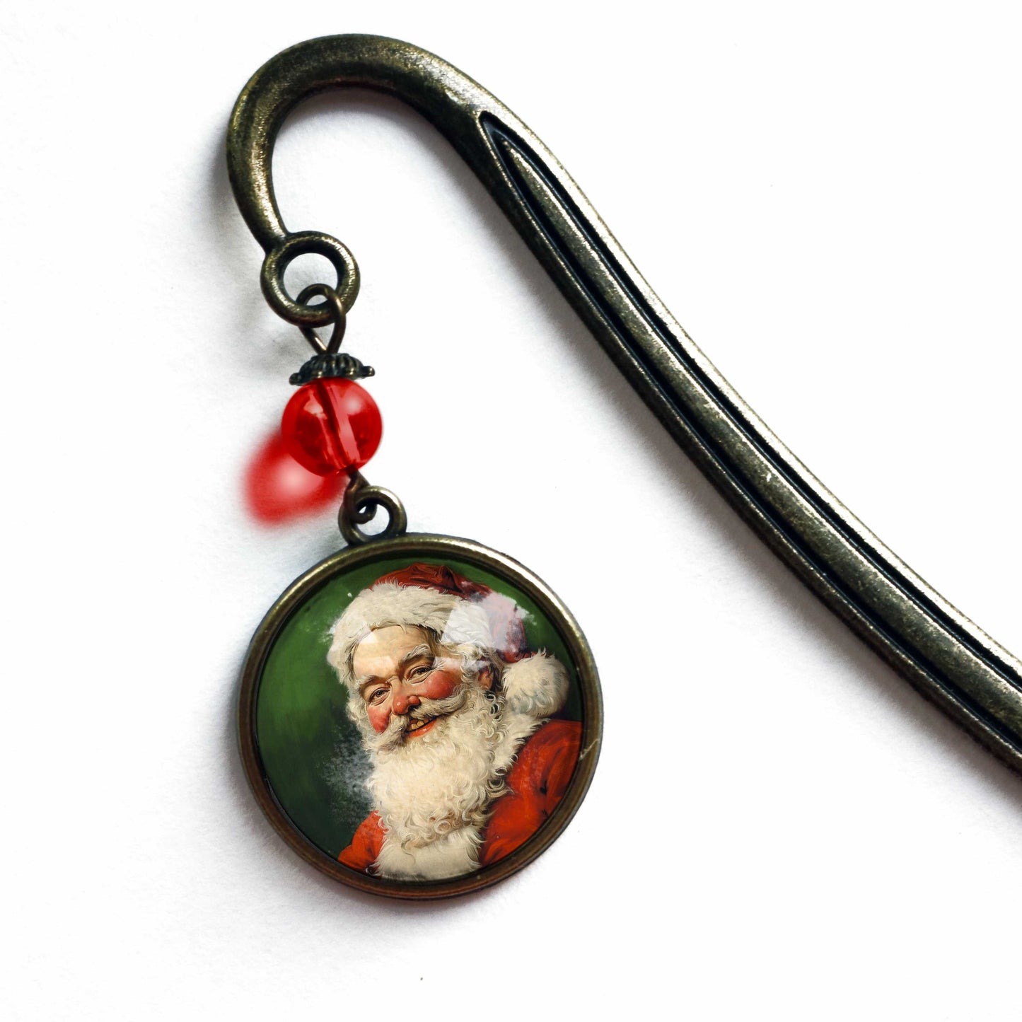 Marcapáginas navideño de latón de Papá Noel victoriano