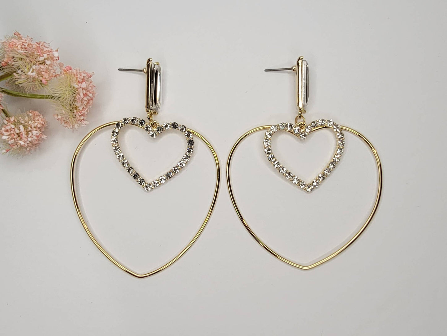 DOUBLE HEART DANGLE EARRINGS.