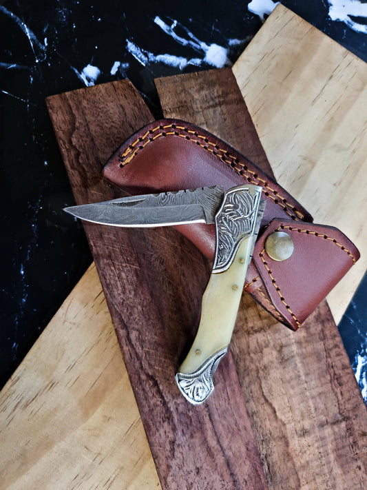 Bone and steel knife with sheath