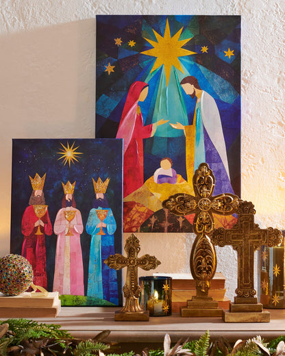 Divine Light Wall Art, A canvas print of a stylized nativity scene with Mary and Joseph at the manger beneath a golden star, in a wood frame.