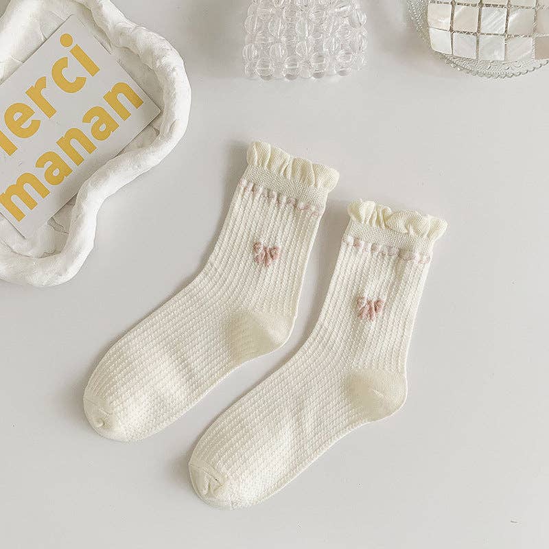 Calcetines blancos con borde enrollado para mujer