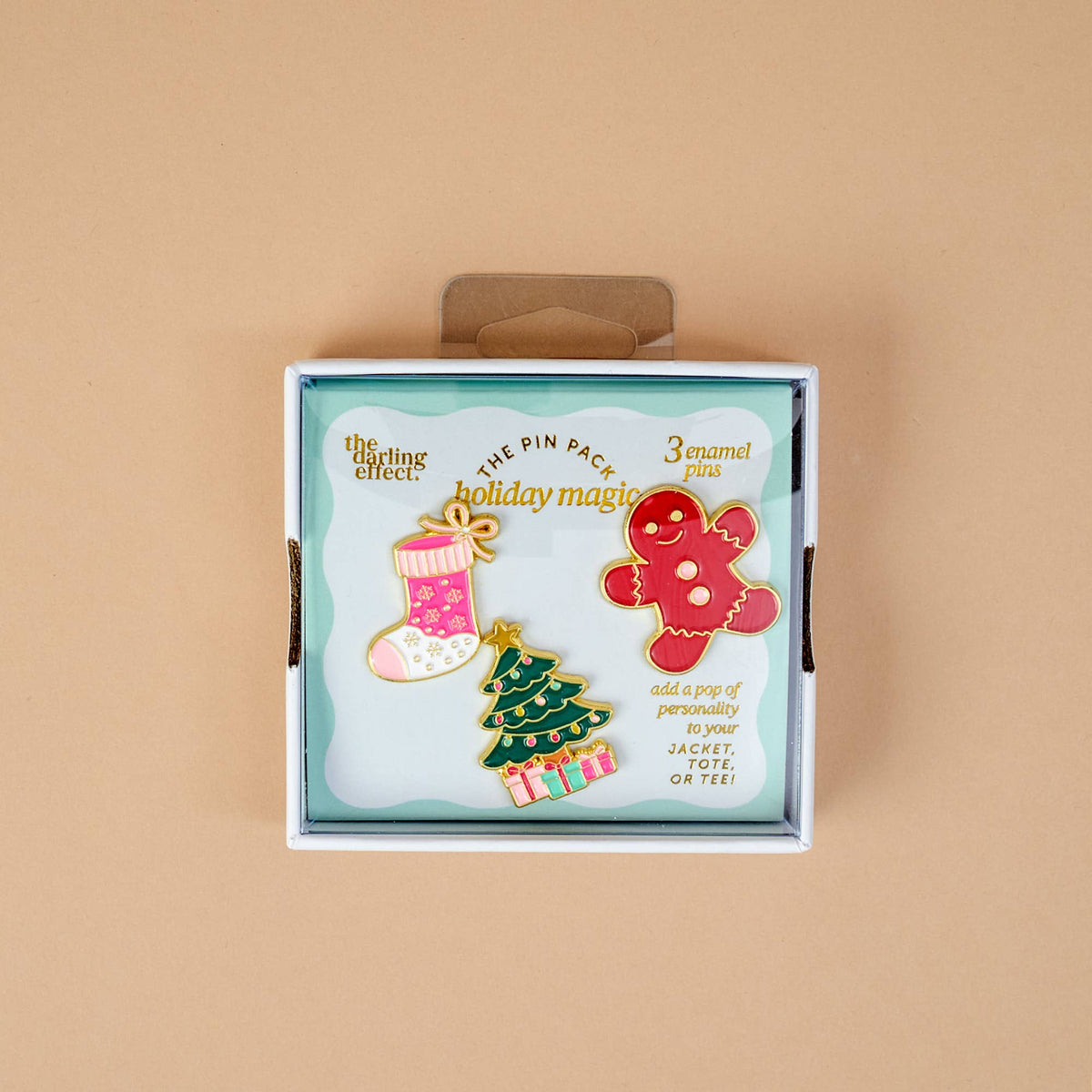Enamel Pin Pack, A boxed set of three gold enamel pins in the Latte Love design, a coffee cup, a teddy bear, and a pink bow.