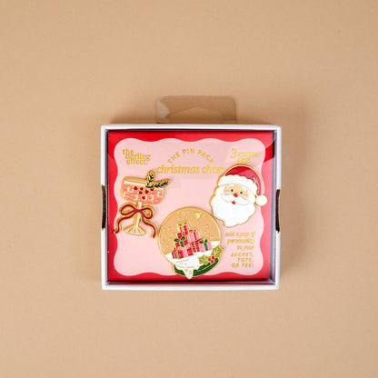 Enamel Pin Pack, A boxed set of three gold enamel pins in the Latte Love design, a coffee cup, a teddy bear, and a pink bow.