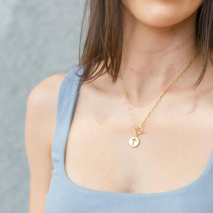 Collar con clip en forma de cruz