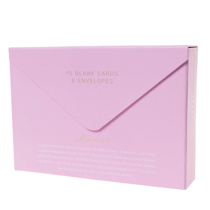 Monet Water Lilies Keepsake Boxed Cards, A pink box with a gold foil bordered reproduction of Monet's Water Lilies painting on the lid, opened to show blank cards and envelopes inside.