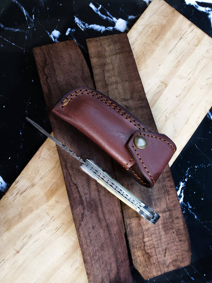 Bone and steel knife with sheath