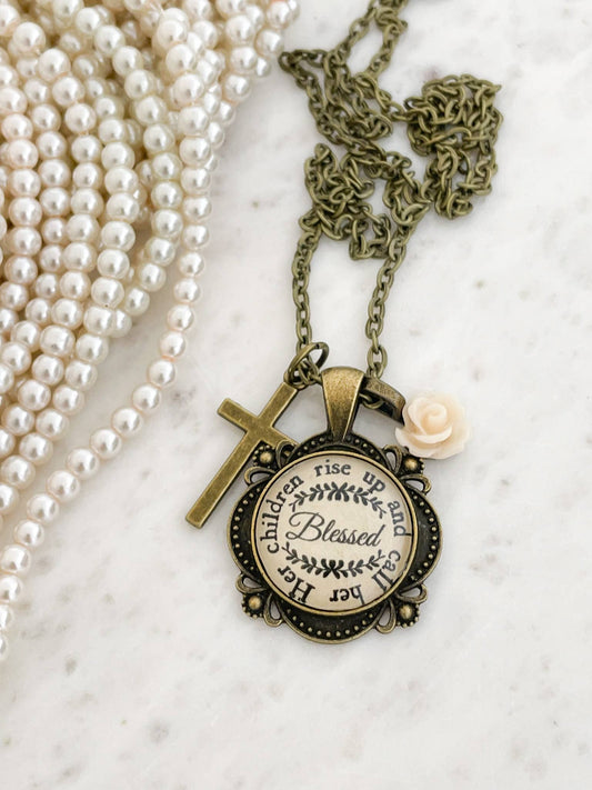 Her children rise up and call her blessed necklace