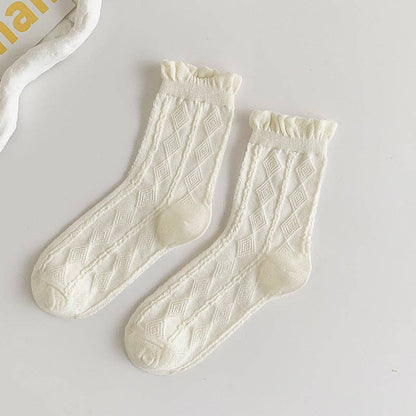 Calcetines blancos con borde enrollado para mujer