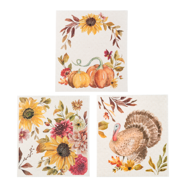 Fall Reusable Dish Cloth, Three square dish cloths printed with a Happy Fall leaf wreath, a mushroom and pinecone bouquet and a scatter of autumn leaves.