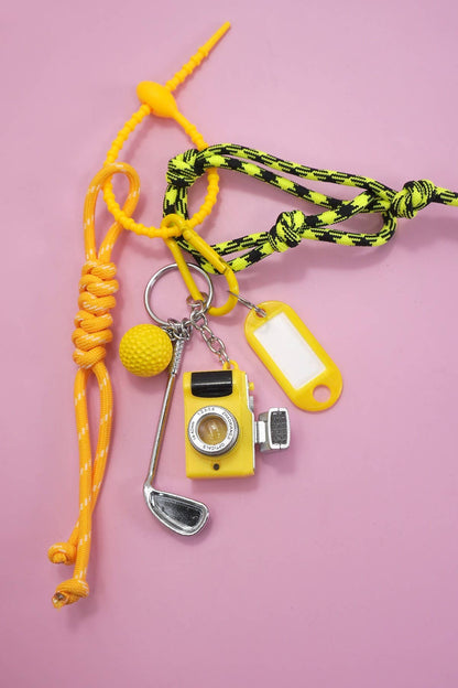 LLAVERO CON DIJE PARA BOLSA DE GOLF CON CABLE DE CUERDA Y CÁMARA