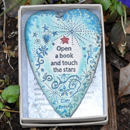 Open a book and touch the stars, education, reading, gift