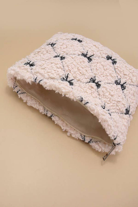JOSSLYN de wall to wall - BOLSA PARA COSMÉTICOS BOW DE LANA DE CORDERO SUAVE | 40P539