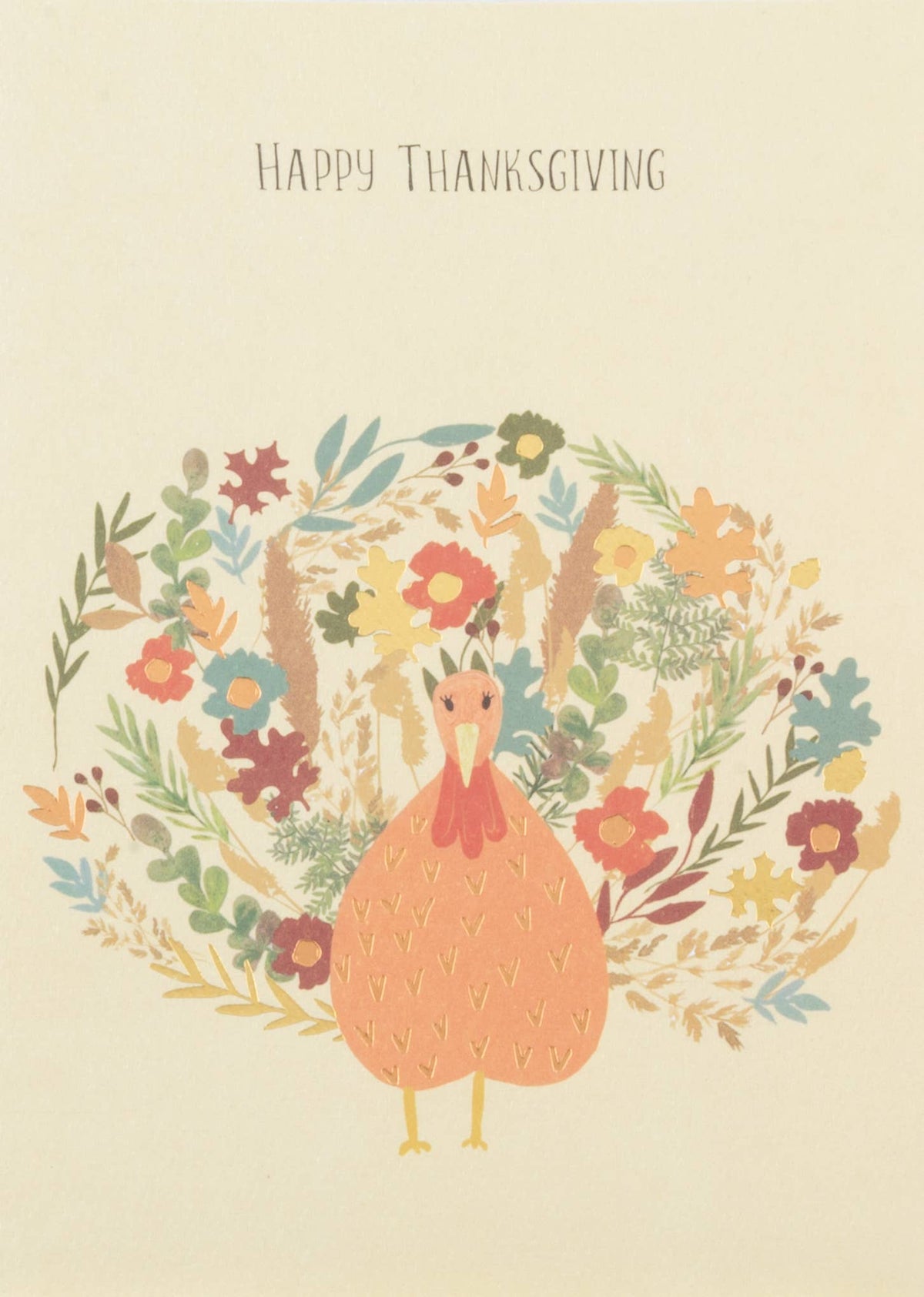 Floral Turkey Greeting Card, Front of a cream card with HAPPY THANKSGIVING in thin hand lettering above an orange turkey whose tail fan is made of small red, blue and mustard flowers, oak leaves and grasses.