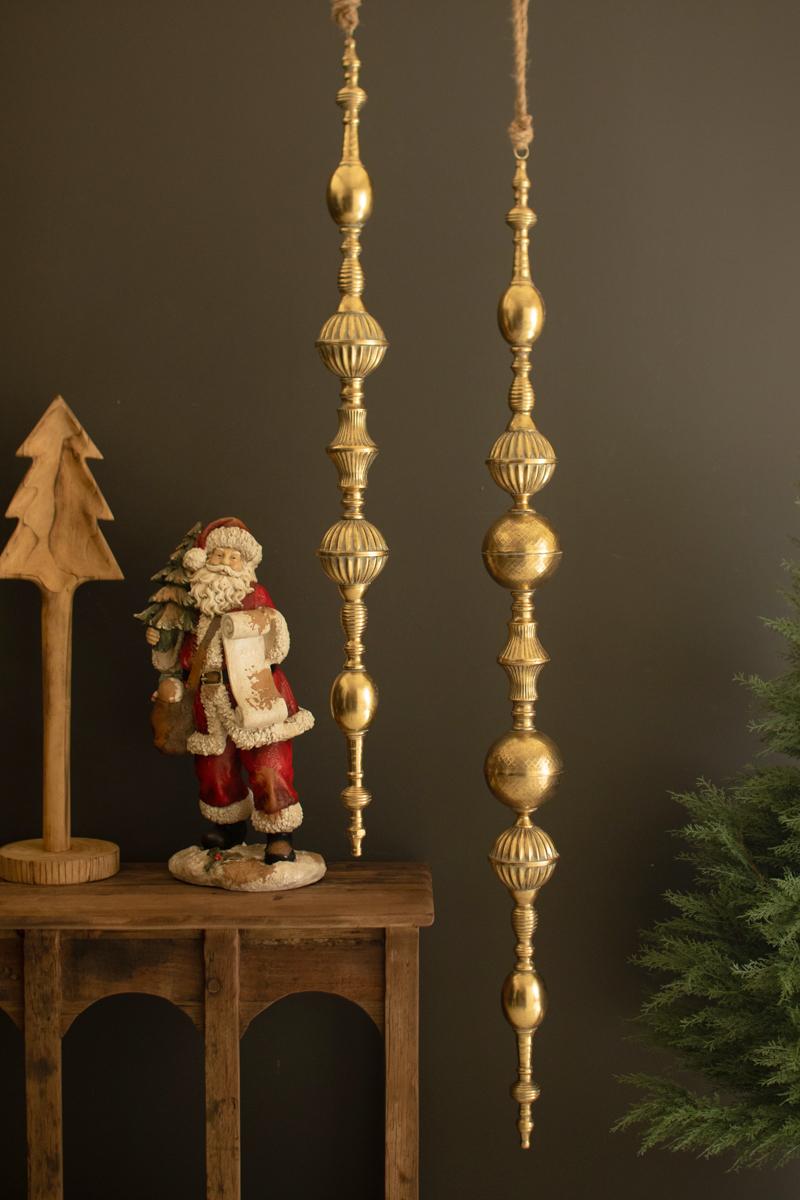 Giant Metal Christmas Finial, Two tall hanging metal finials in a distressed gold finish, one longer than the other.