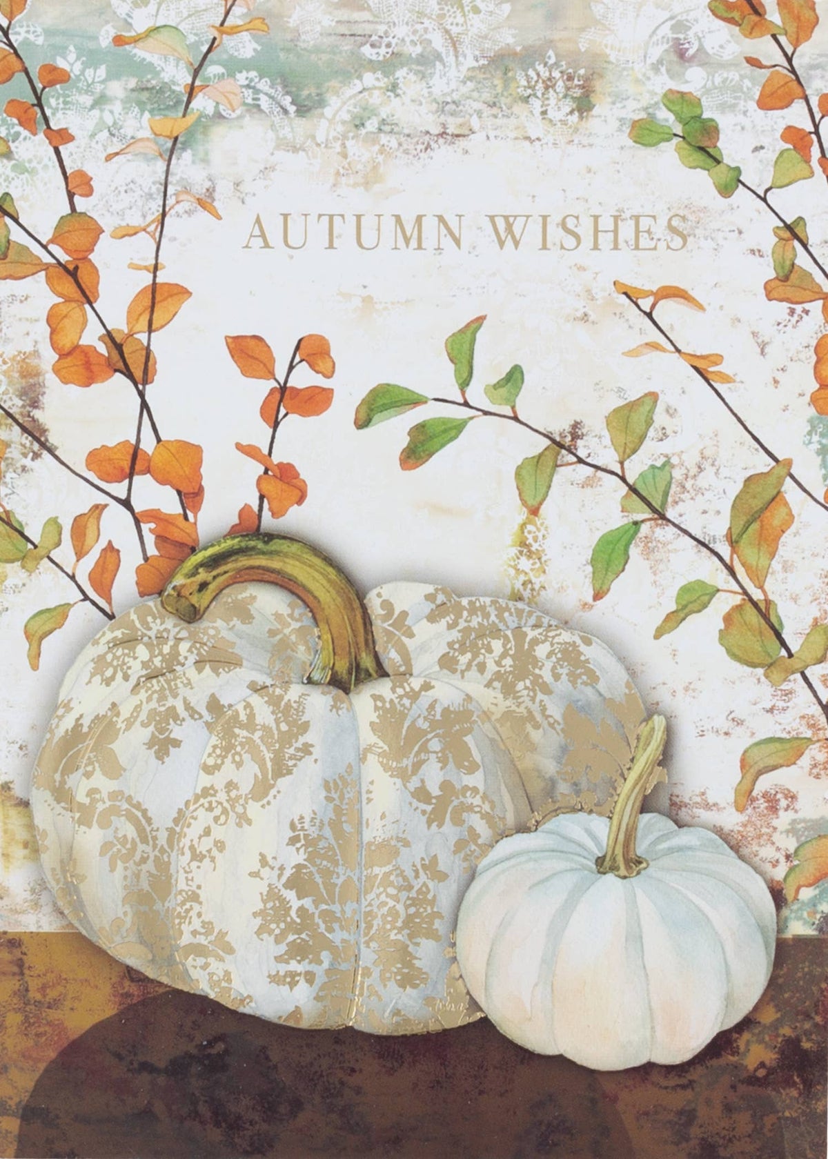 Gilded White Pumpkins Greeting Card, Front of a card with a large white pumpkin patterned in gold foil beside a smaller pale pumpkin, orange and green autumn leaves behind them and AUTUMN WISHES in gold at the top.