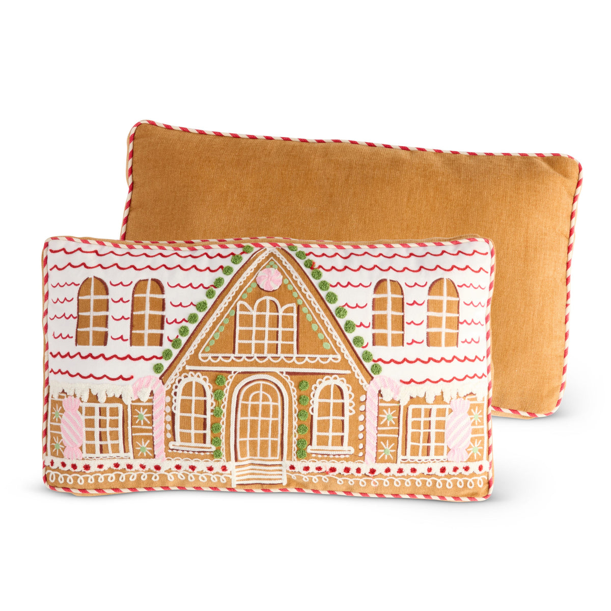 Gingerbread House Throw Pillow, A rectangular pillow embroidered with a gingerbread house in white icing, arched windows, green bobbles and pink candy canes, edged in red and white twisted cord and shown with its plain brown back.