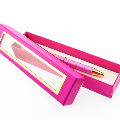 Glitter All the Way Deluxe Pen, A pink glitter click pen with a gold metal clip, tip, and click top.