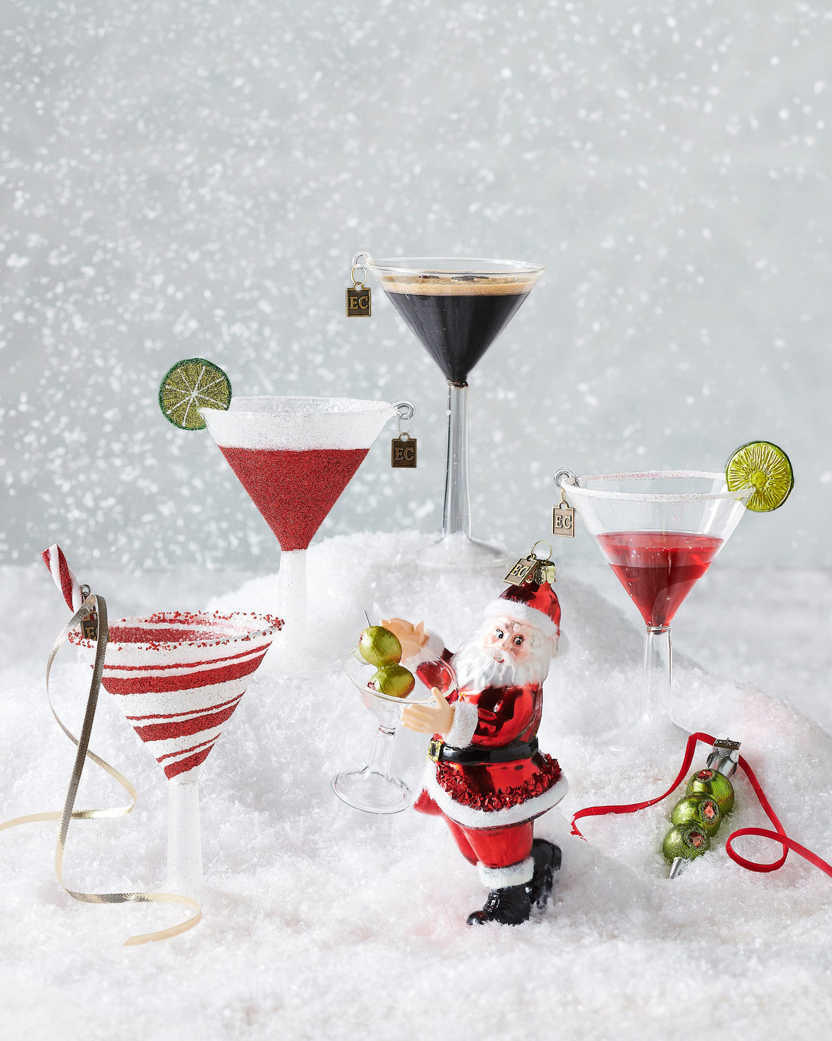 Just One Drink Santa Ornament, A red glass Santa ornament holding a martini glass with two olives on a pick.