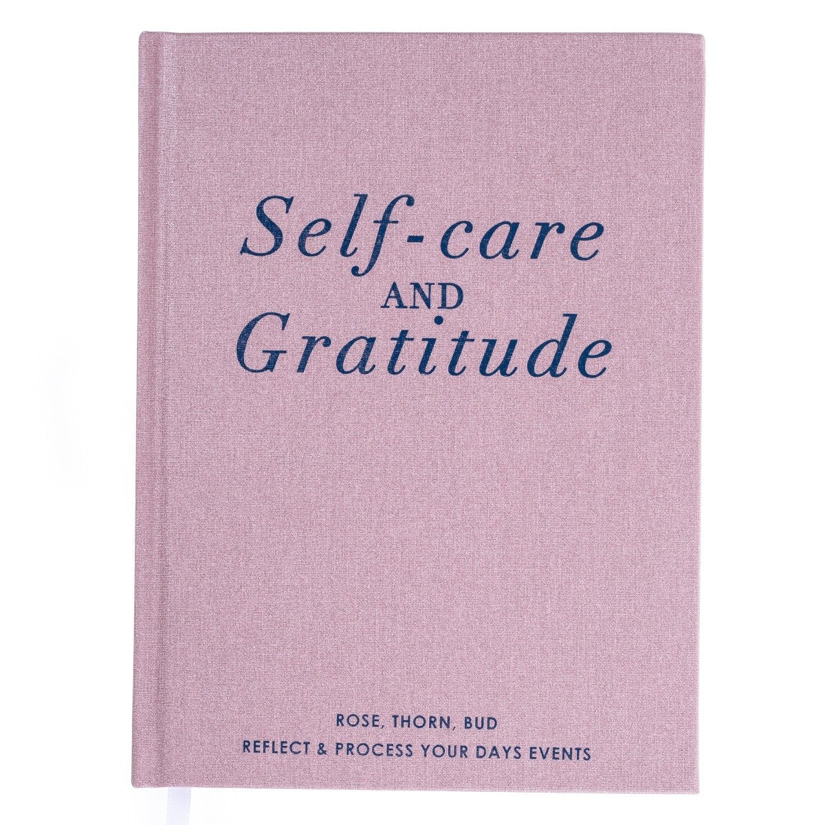 Gratitude Self-Care Journal, A dusty mauve fabric journal with 'Self-care and Gratitude' in navy foil above a rose, thorn, bud reflection format.