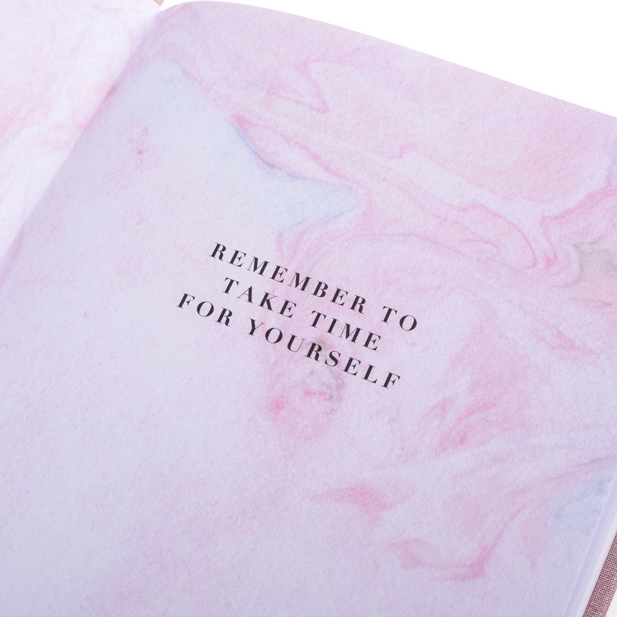 Gratitude Self-Care Journal, A dusty mauve fabric journal with 'Self-care and Gratitude' in navy foil above a rose, thorn, bud reflection format.