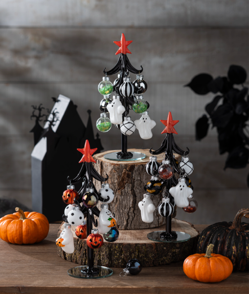 Halloween Tree with Ornaments, Three black glass trees with red stars on round mirrored bases, each hung with Halloween glass ornaments including ghosts, jack-o-lanterns, bats and stripes.