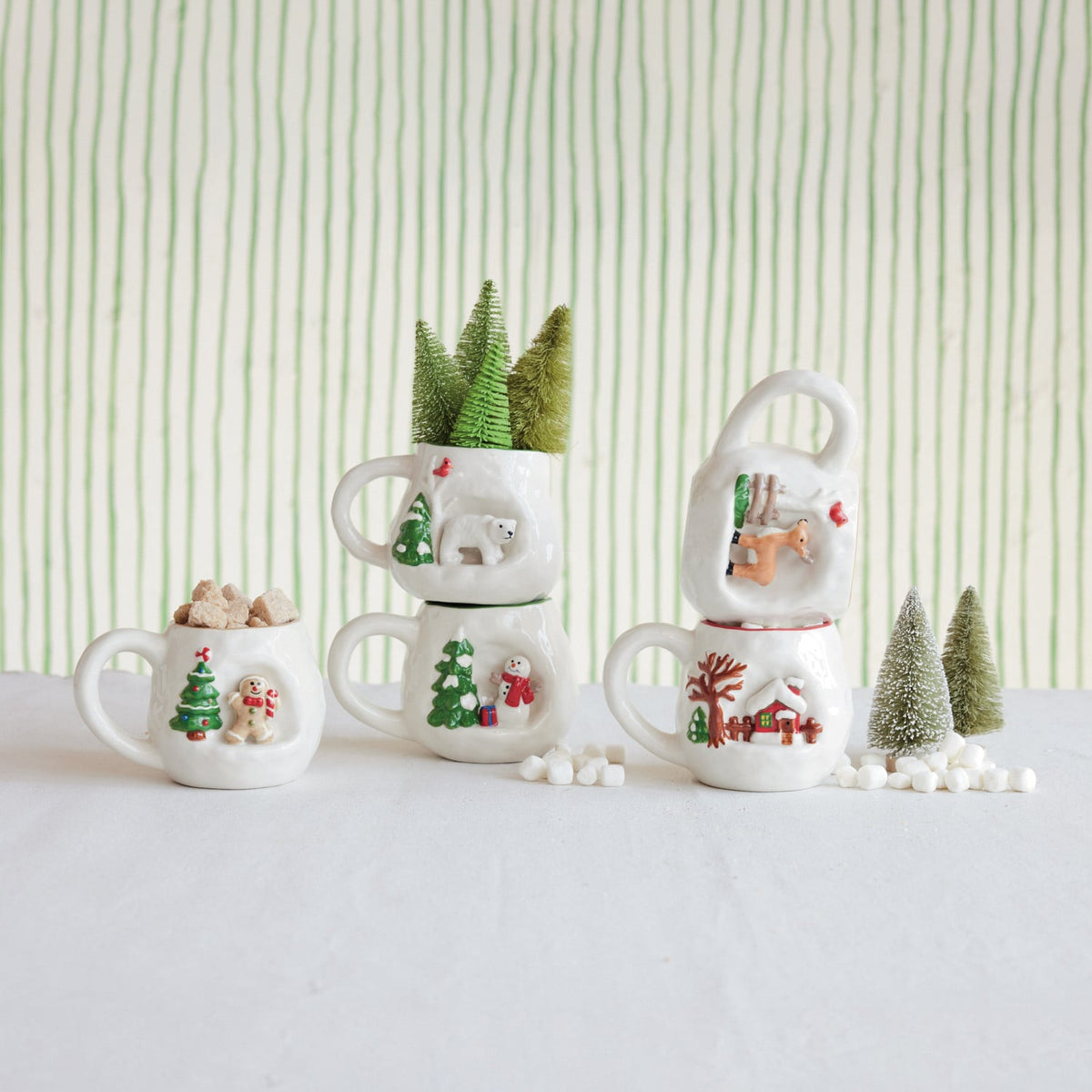 Hand-Painted Stoneware Christmas Mug, shown in a styled holiday setting